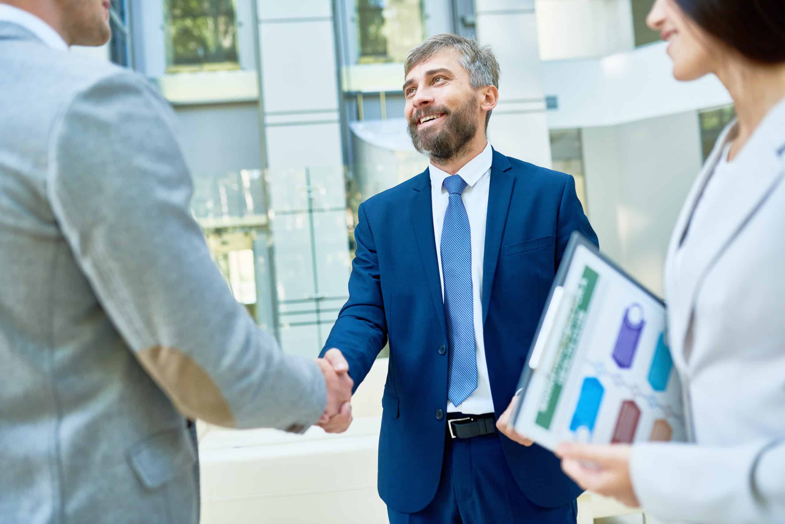 Handshake of Business Partners "I'll get tha to you in the next delivery."